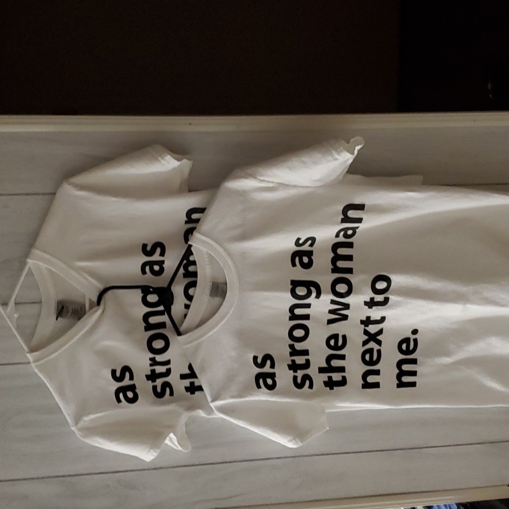 EUC Matching tees, both size small. White black lettering. NEVER WORN